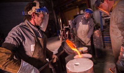 Pouring melted metal alloys